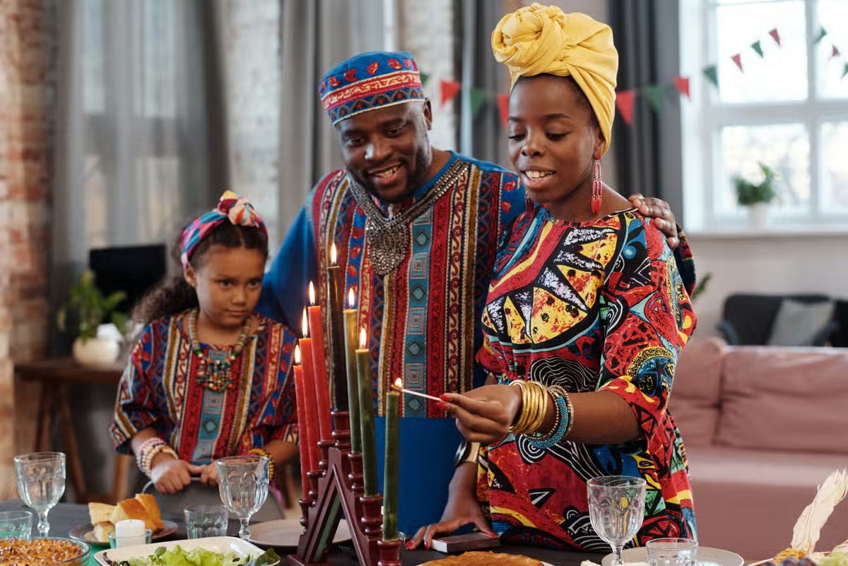 What are the fruits of Kwanzaa? Who created Kwanzaa and why?