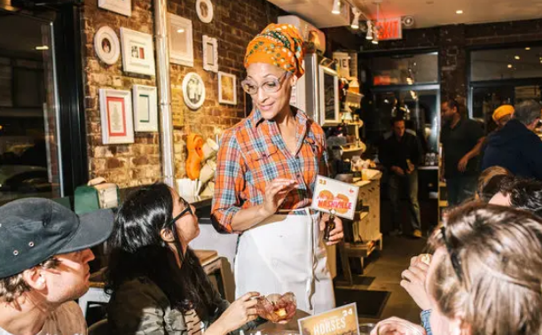 Why did Carla Hall’s restaurant close?