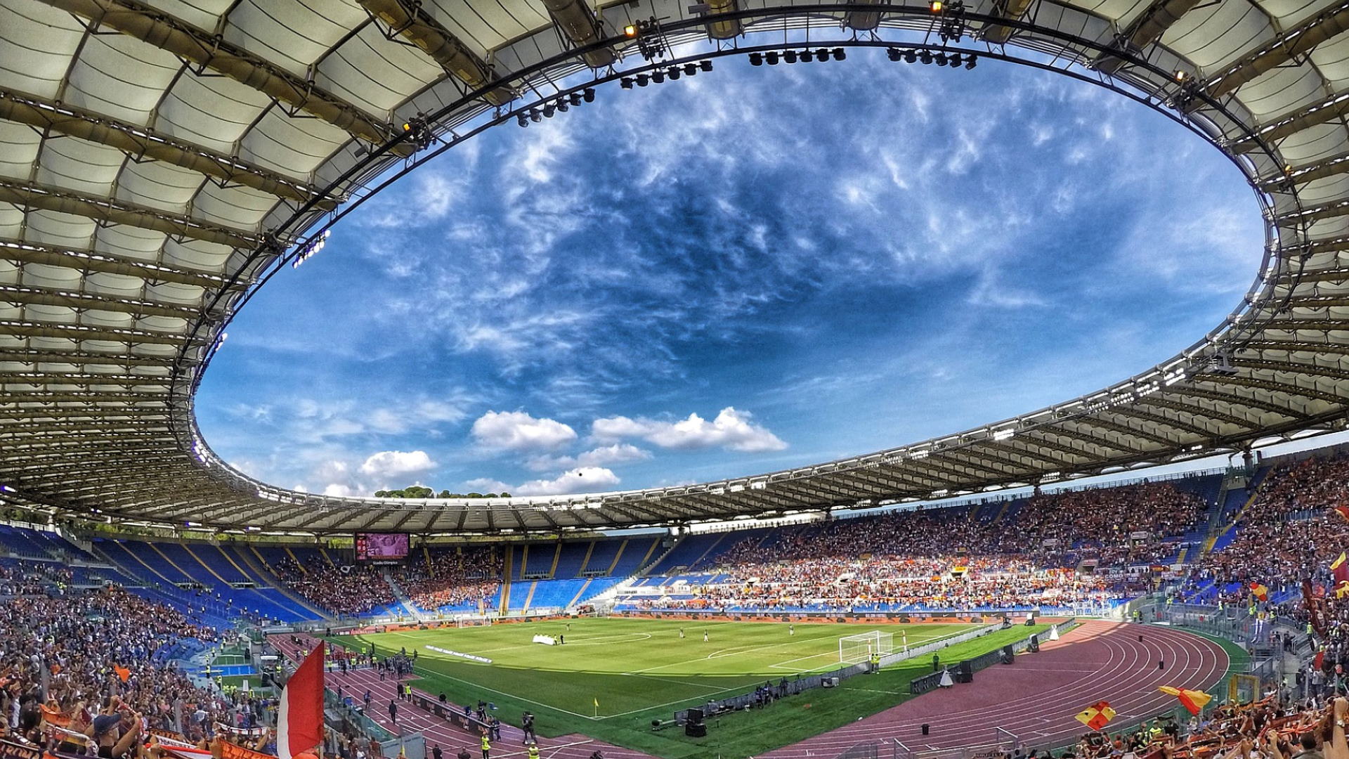 Who plays football at Stadio Olimpico? What football team plays at Stadio Olimpico?