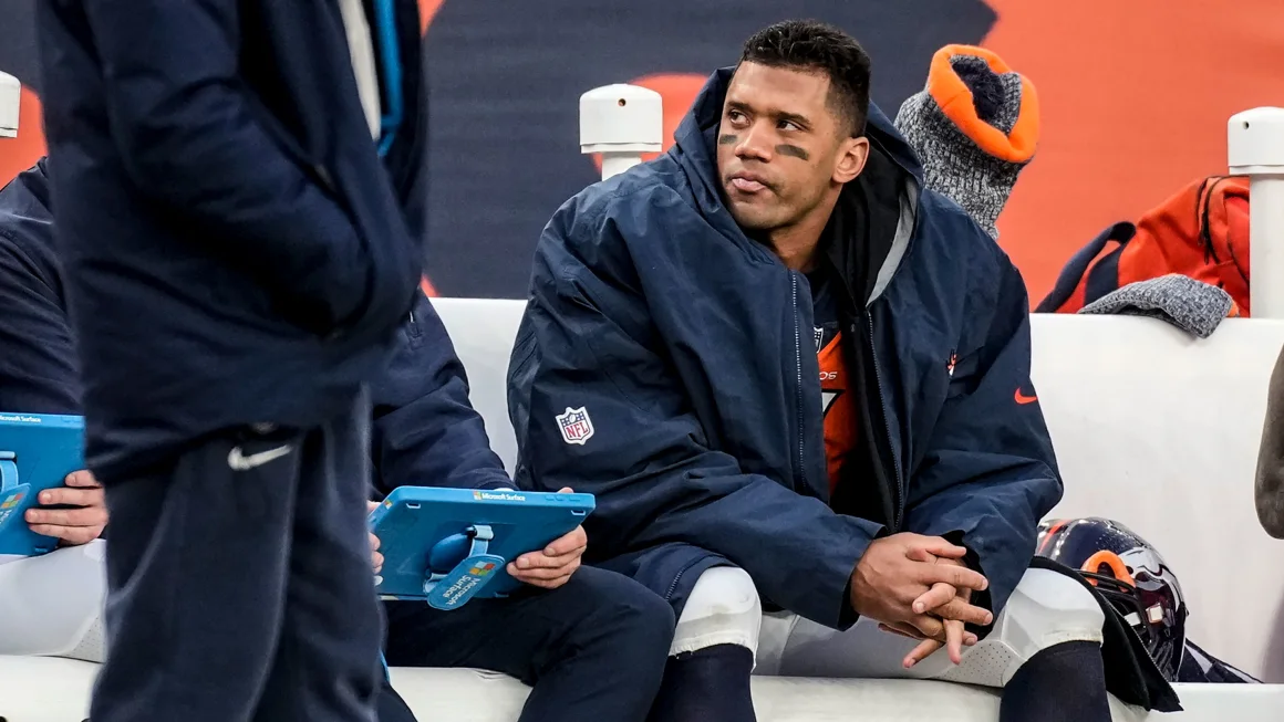 Why did the Broncos release Russell Wilson?