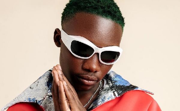 Olivetheboy Reflects on Surviving Music and Schooling: ‘My Mother Wanted to Have Me Arrested’