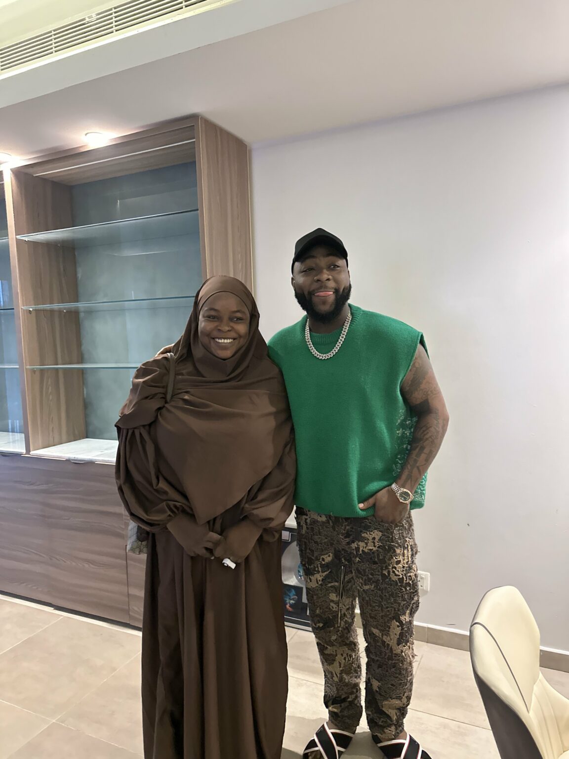 Woman Overwhelmed as Davido Supports Her Guinea Fowl Business