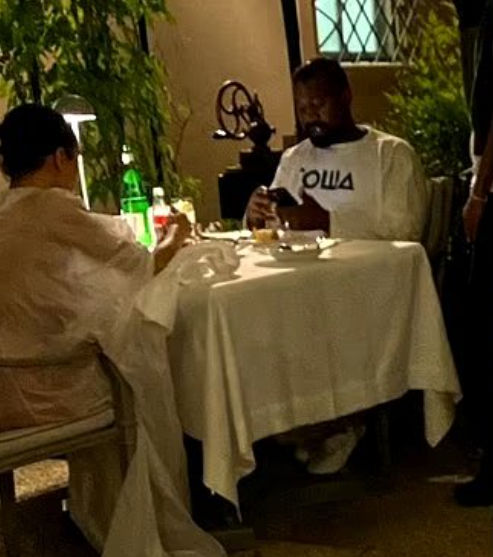 Bianca Censori Dines with Kanye in Italy, Wears Sheer Poncho with Nothing Underneath (Photos)