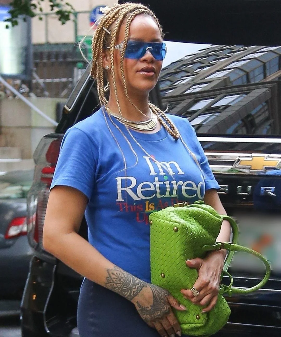 Rihanna Teases Fans with ‘I’m Retired’ T-Shirt Amid Eight-Year Album Drought (Photos)